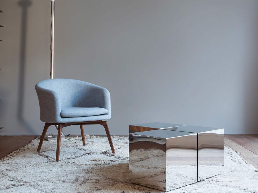 Upholstered designer chair for commercial interiors